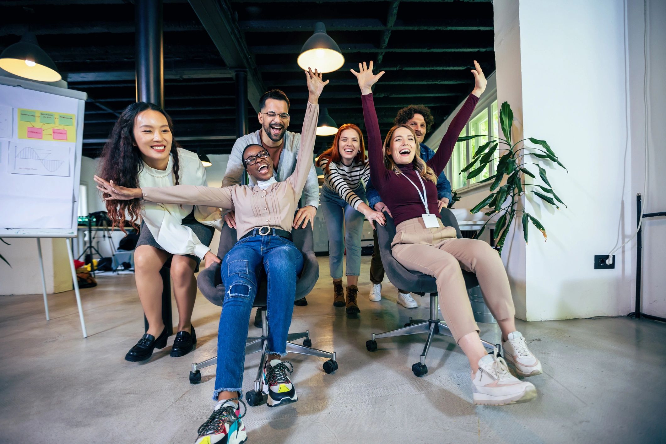 young diverse team playful office