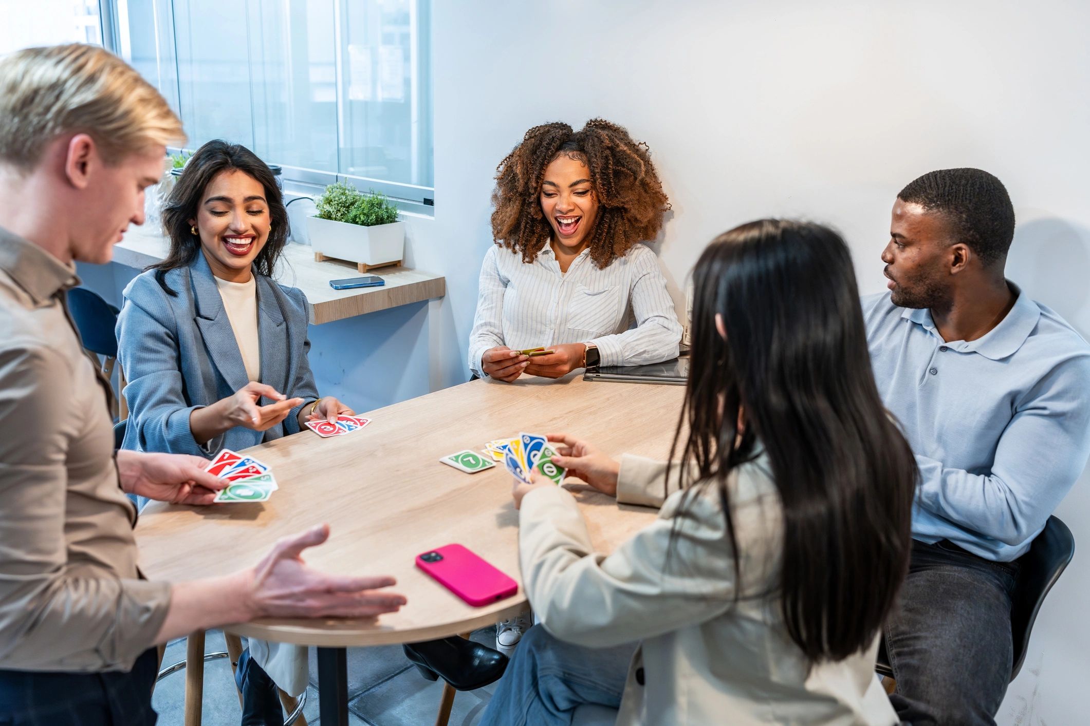 young diverse team playful office