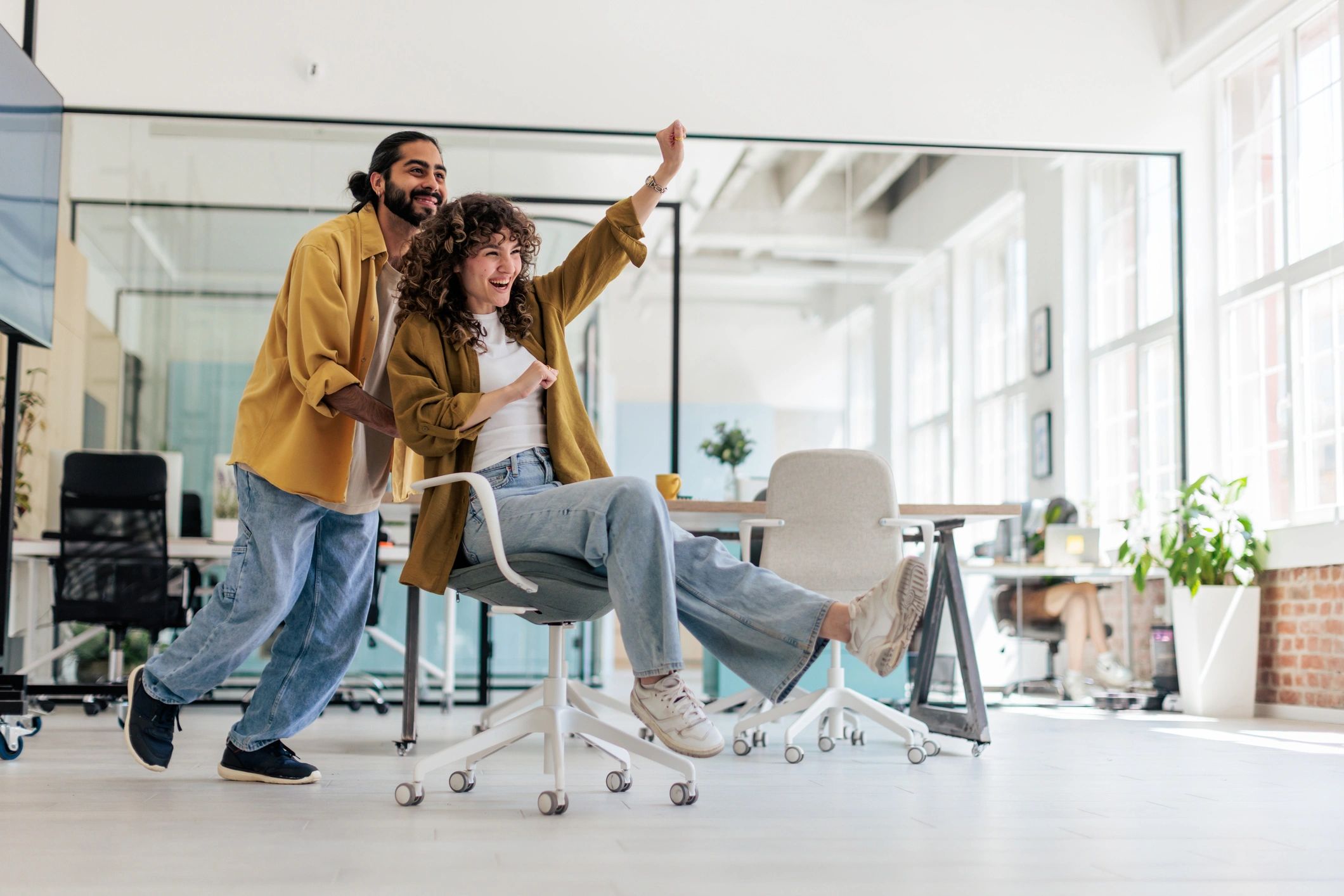 young diverse team playful office